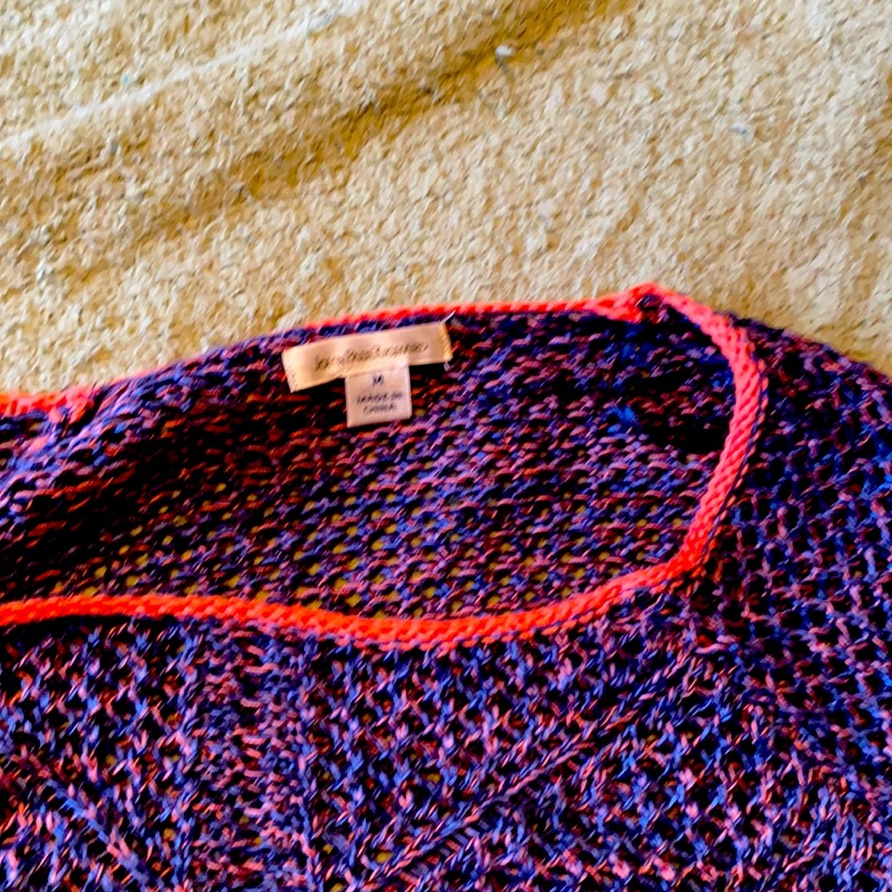 Knit airy  see pictures as need shirt underneath  relaxed fit